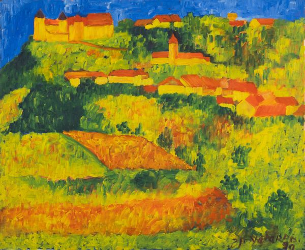 Village aux toits rouges dispersé sur des collines vertes sous un ciel bleu soutenu